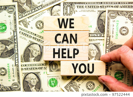 Support and we can help you symbol. Concept words We can help you on wooden blocks. Beautiful background from dollar bills. Businessman hand. Business psychological we can help you concept. Copy space Support and we can help you symbol. Concept words We can help you on wooden blocks. Beautiful background from dollar bills. Businessman hand. Business psychological we can help you concept. Copy space 97522444