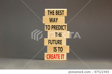 Create future symbol. Concept words The best way to predict the future is to create it on wooden blocks. Beautiful grey background copy space. Business create your future concept. Create future symbol. Concept words The best way to predict the future is to create it on wooden blocks. Beautiful grey background copy space. Business create your future concept. 97522493