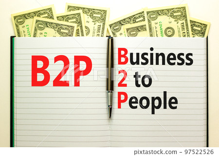 B2P business to people symbol. Concept words B2P business to people on white white note on a beautiful background from dollar bills. Business and B2P business to people concept. Copy space. 97522526