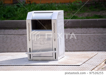 Stainless steel garbage cans for separate disposal of recycle trash on city street 97526255