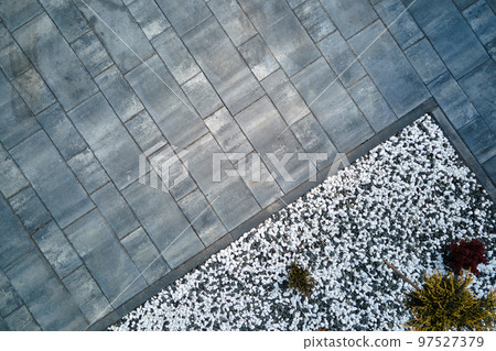 Front or back yard landscape design of stone tile pavement. Exterior from above 97527379