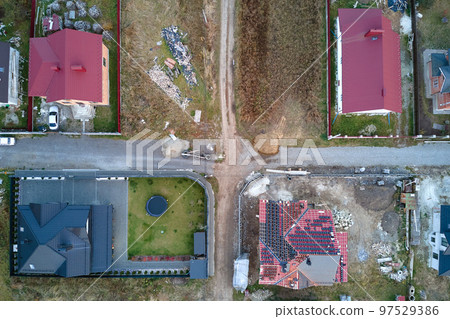 Aerial view of residential houses in suburban rural area 97529386