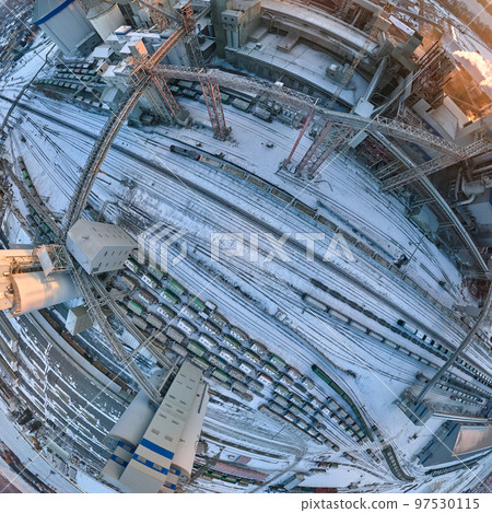 Aerial view of cargo train cars loaded with construction goods at mining factory. Railway transportation of industrial production raw materials Aerial view of cargo train cars loaded with construction goods at mining factory. Railway transportation of industrial production raw materials 97530115