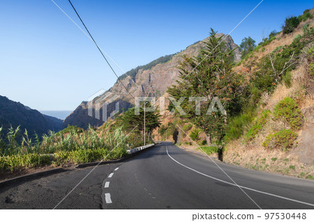 Summer landscape of Madeira island with an empty mountain road 97530448
