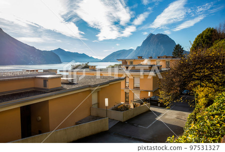 4-story residential building on the coastline of Lake Lugano 4-story residential building on the coastline of Lake Lugano 97531327