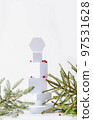 Minimalistic eco friendly scandinavian christmas background in white colors. Fir branches and white empty podium 97531628