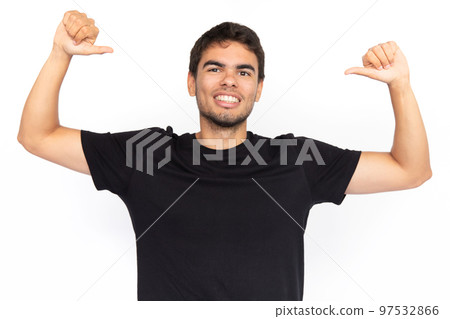 Excited young man pointing thumbs at himself 97532866