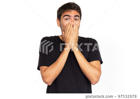 Shocked young man covering face 97532878