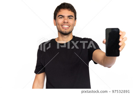 Happy young man showing phone screen 97532891