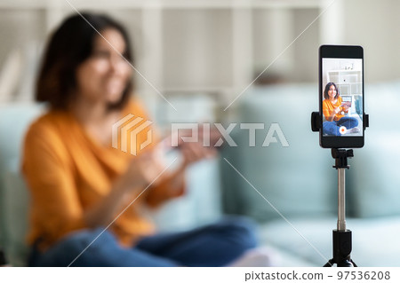 Young Arab Beauty Influencer Recording Makeup Review At Home Young Arab Beauty Influencer Recording Makeup Review At Home 97536208