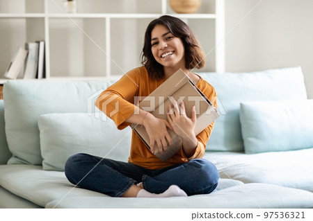 Delivery Concept. Happy Arab Man Holding Big Cardboard Box At Home Delivery Concept. Happy Arab Man Holding Big Cardboard Box At Home 97536321