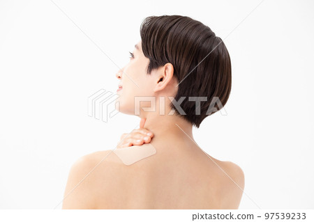 Woman applying poultice white background 97539233