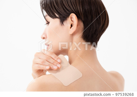 Woman applying poultice white background 97539268