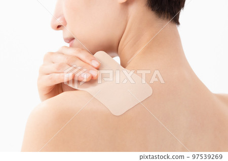 Woman applying poultice white background Woman applying poultice white background 97539269