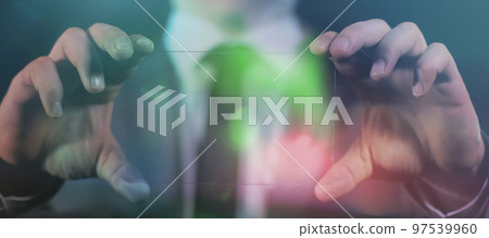 Transparent screen in the hands of a businessman. Transparent screen in the hands of a businessman. 97539960