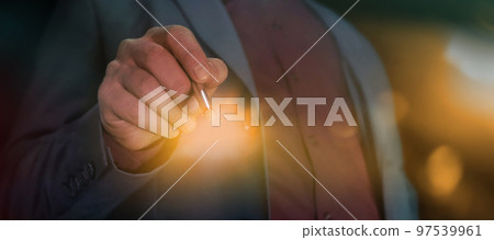 Businessman touching an invisible screen with a stylus. Businessman touching an invisible screen with a stylus. 97539961