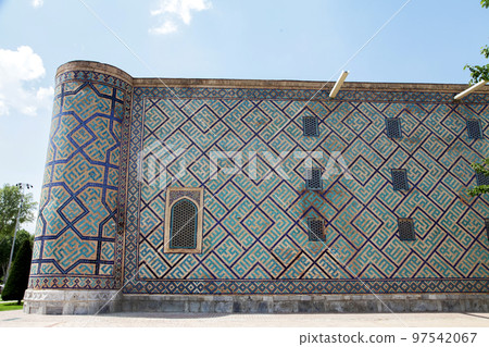 Sherdor Madrasah on Registan Square in Samarkand in Uzbekistan. Side mosaic wall. 29.04.2019 Sherdor Madrasah on Registan Square in Samarkand in Uzbekistan. Side mosaic wall. 29.04.2019 97542067