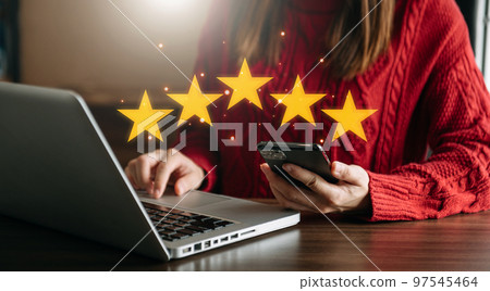 Customer or client the stars to complete five stars. with copy space. giving a five star rating. Service rating, satisfaction concept.. 97545464