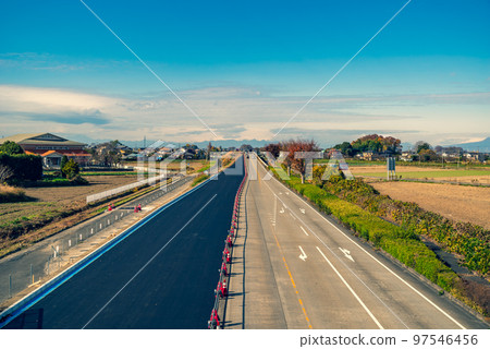 Work to increase the number of lanes on the main road Overhead view of the outbound direction of National Route 17 Jobu Road 2022.12 c-5 Addition of warm colors 97546456