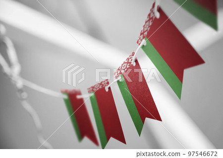 A garland of Belarus national flags on an abstract blurred background 97546672