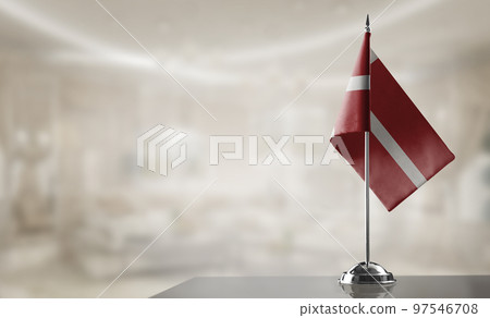 A small Denmark flag on an abstract blurry background 97546708