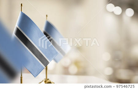 Small flags of the Botswana on an abstract blurry background Small flags of the Botswana on an abstract blurry background 97546725