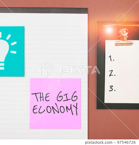 Hand writing sign The Gig Economy. Word Written on Market of Short-term contracts freelance work temporary Hand writing sign The Gig Economy. Word Written on Market of Short-term contracts freelance work temporary 97546726