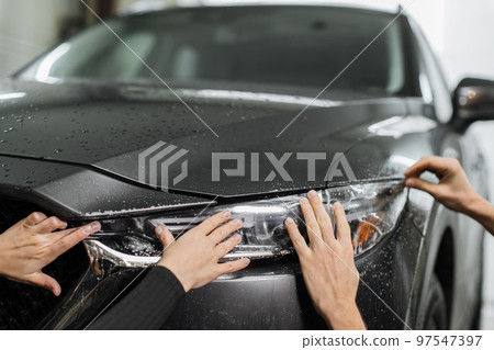 Close up to PPF installation process on a front - Stock Photo [97547397]  - PIXTA