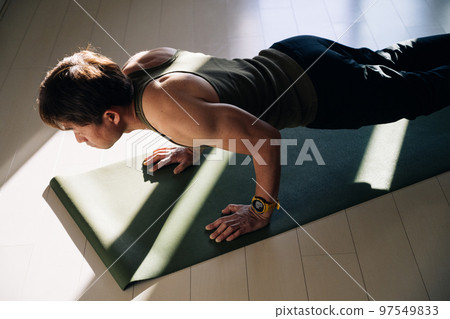 A man doing push-ups and muscle training 97549833