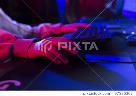 E-sports image Girl's hand playing online games E-sports image Girl's hand playing online games 97550362