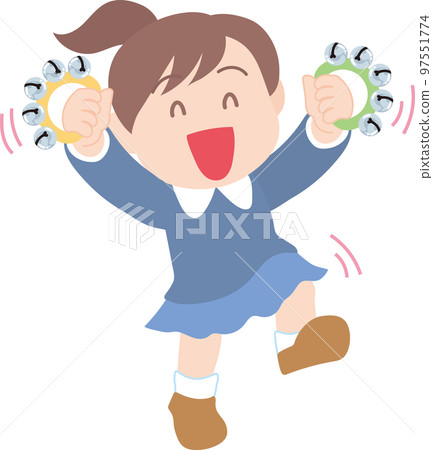 Child playing a musical instrument _ Girl playing a bell Child playing a musical instrument _ Girl playing a bell 97551774