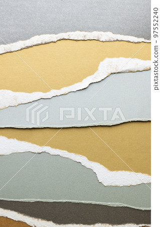 Ripped up pieces of coloured paper with copy space 97552240