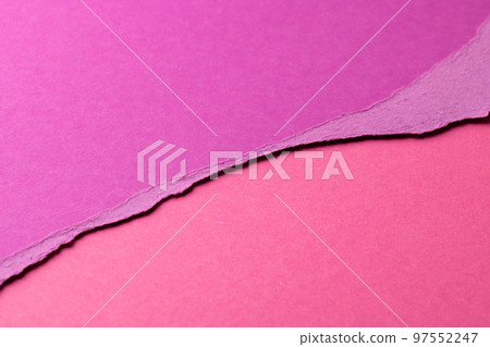 Ripped up pieces of coloured paper with copy space 97552247