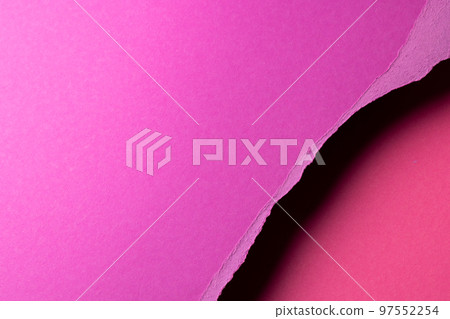 Ripped up pieces of coloured paper with copy space 97552254