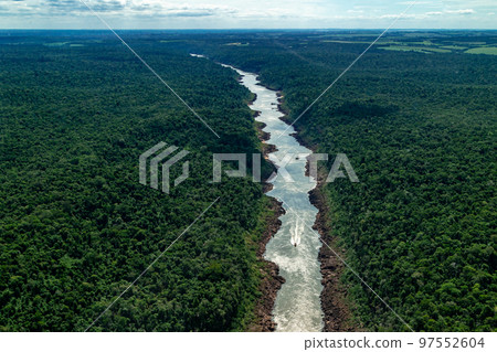river in the rain forest of south america 97552604