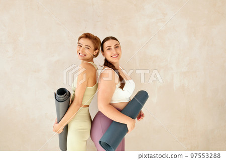 Laughing Women Posing After Yoga. Female Friends Laughing 97553288