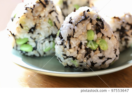 Triangular rice balls mixed with salted kelp and edamame 97553647