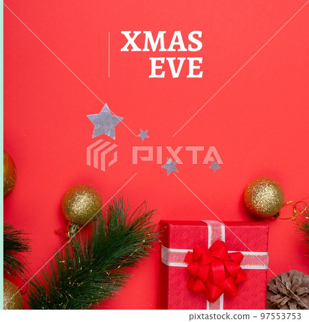 Composition of christmas eve text over christmas decoration Composition of christmas eve text over christmas decoration 97553753