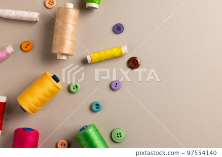 Composition of sewing equipment on beige background with copy space 97554140