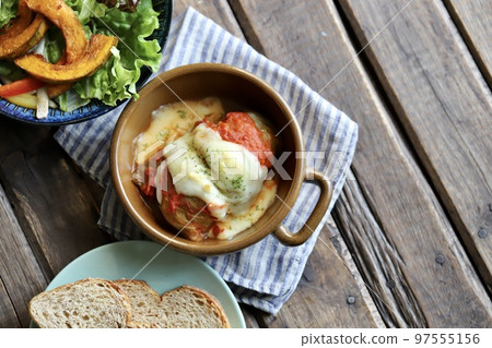 A healthy meal full of vegetables with cabbage rolls and rye bread 97555156