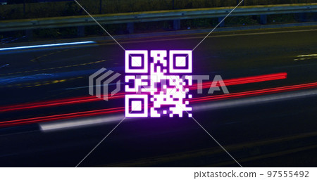 QR code scanner against light trails on black background 97555492