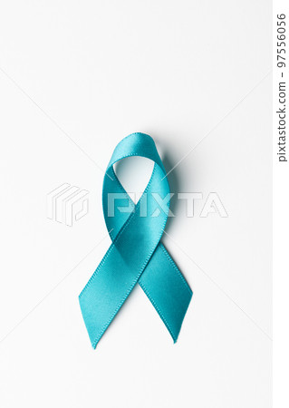 Close up of blue ribbon on white background with copy space 97556056