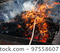 New Year's tradition Dondo-yaki 97558607