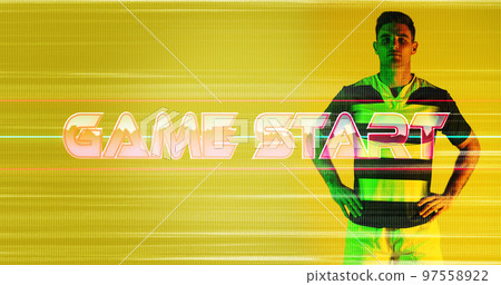 Game start text and glitch technique with caucasian rugby player standing on yellow background Game start text and glitch technique with caucasian rugby player standing on yellow background 97558922