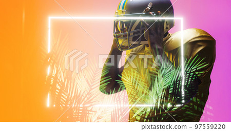 Composite of american football player removing helmet by illuminated plants and rectangle 97559220