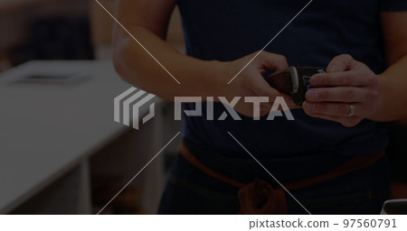 Image of data processing with graph over diverse people paying with smartwatch 97560791