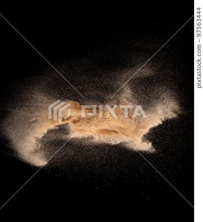 Small size fine Sand flying explosion, Golden grain wave explode. Abstract cloud fly. Yellow colored sand splash silica in Air, Galaxy star universe sign symbol. Element Black background Isolated Small size fine Sand flying explosion, Golden grain wave explode. Abstract cloud fly. Yellow colored sand splash silica in Air, Galaxy star universe sign symbol. Element Black background Isolated 97563444