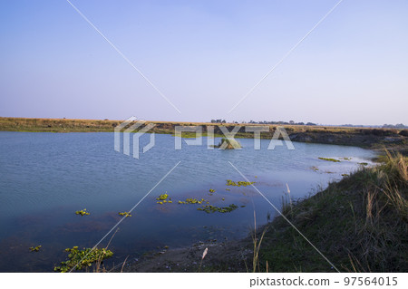 Crystal clear blue water lake landscape view nearby Padma river in Bangladesh 97564015