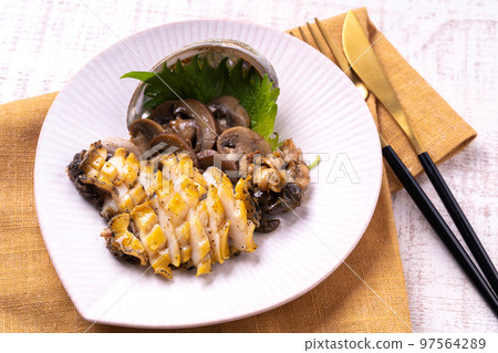 Grilled abalone with butter Grilled abalone with butter 97564289