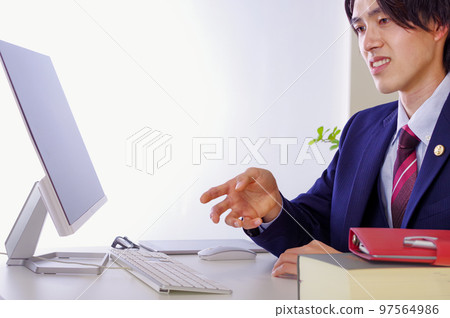 Male lawyer listening to legal advice 97564986